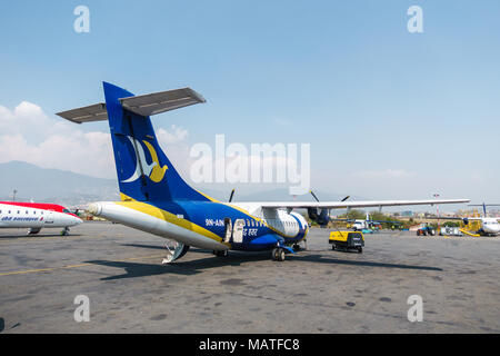 KATHMANDU, NEPAL - CIRCA MARCH 2108: A Buddha Air ATR 42 at Tribhuvan International Airport. Stock Photo