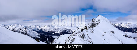 panorama winter mountain landscape with peaks and the lakes near St. Moritz in the background Stock Photo
