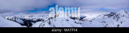 panorama winter mountain landscape with peaks and the lakes near St. Moritz in the background Stock Photo