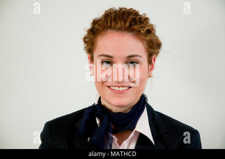 Portrait of young executive woman smiling and looking at the camera. Stock Photo