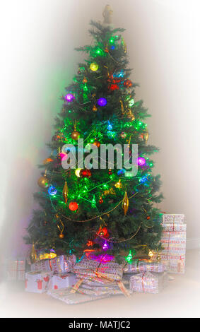 Isolated, illuminated christmas tree. Stock Photo