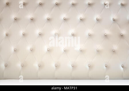 Luxury empty bedroom background, soft headboard and white bedding sheets on bed Stock Photo