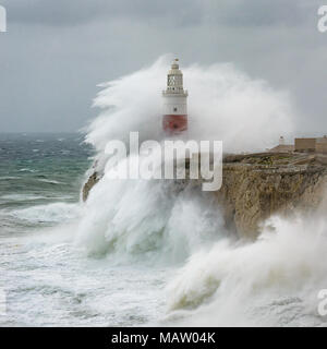 Huge waves engulf Europa Point Lighthouse, Gibraltar Stock Photo