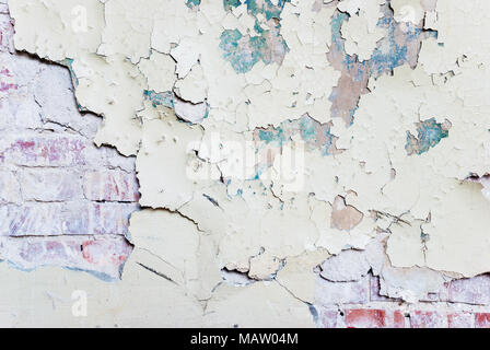 Old paint peeling from wall texture background Stock Photo