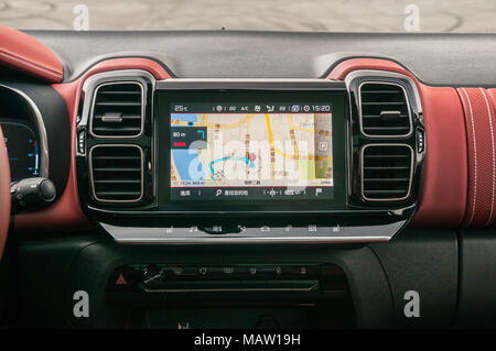 Infotainment screen displaying a map on the Citroen C5 Aircross as on a test drive in Shanghai, China. Stock Photo