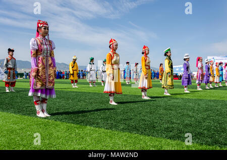 Traditional Costumes at the Naadam Festival Opening Ceremony, Murun, Mongolia Stock Photo