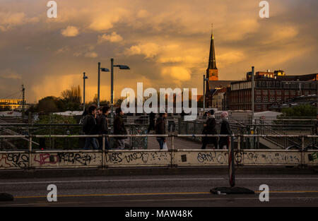 A dramatic sky over Warschauer Strasse in Berlin, Germany. Stock Photo