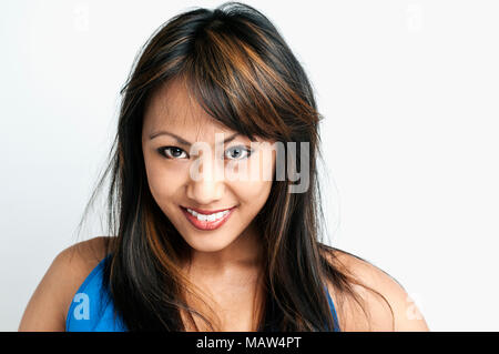 A headshot of a young woman. Stock Photo