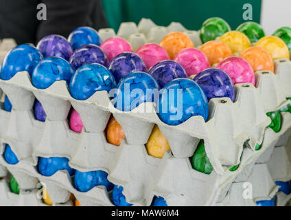Cardboard box with colored easter eggs Stock Photo