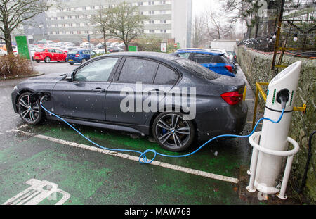 Electric car re charging at an Ever Warm electric charging station, Edinburgh UK