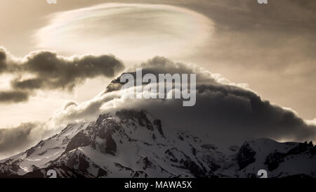 Snow peak of Mount Kazbek in the evening. Georgia. Stock Photo