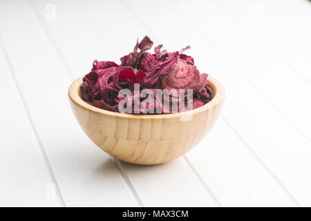 Dried beetroot chips in bowl. Stock Photo