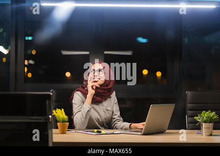 Arab lady working at the office Stock Photo