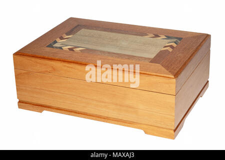 A closed brown wooden box of cigars, humidor. Stock Photo