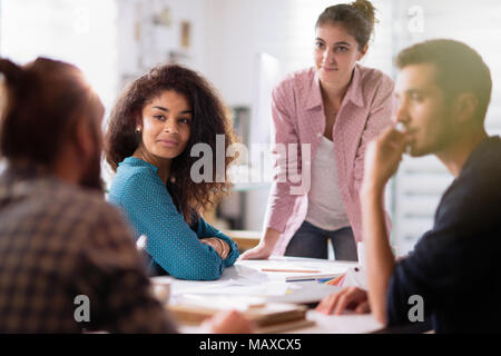 meeting office. young woman presents her project to her colleagues Stock Photo