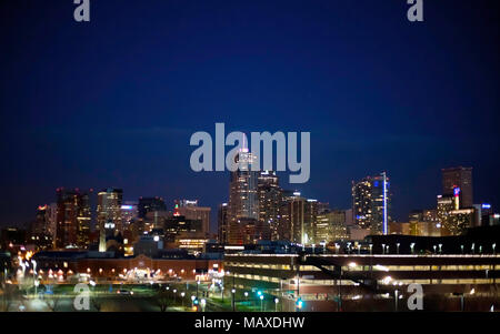 Cityscape of the downtown Denver Skyline at Night, with Bright Neon Lights – Denver, Colorado, USA Stock Photo