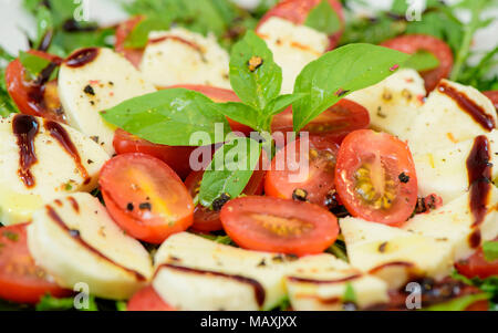 italian salad with rucola, mozzarella and tomatoes Stock Photo