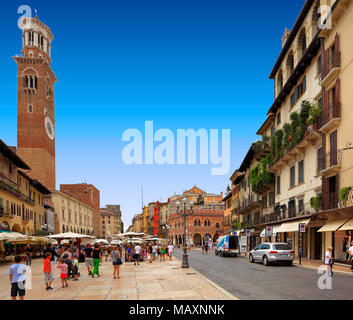 Verona, Veneto / Italy - 2012/07/06: Verona historic city center - Torre dei Lamberti Tower at the Piazza Erbe Square Stock Photo