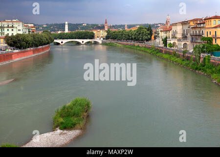 Verona, Veneto / Italy - 2012/07/06: Verona historic city center with Ponte della Vittoria bridge over the Adige river Stock Photo