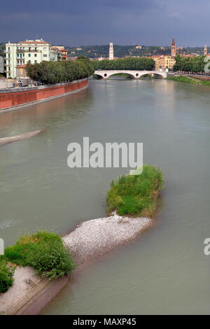 Verona, Veneto / Italy - 2012/07/06: Verona historic city center with Ponte della Vittoria bridge over the Adige river Stock Photo