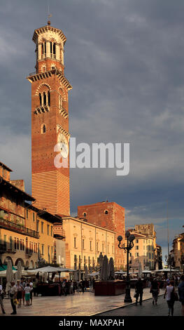 Verona, Veneto / Italy - 2012/07/06: Verona historic city center - Torre dei Lamberti Tower at the Piazza Erbe Square Stock Photo