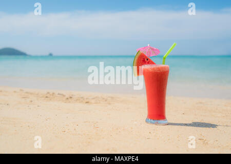 Watermelon cocktail on blue tropical summer beach in Phuket, Thailand. Summer, Vacation, Travel and Holiday concept. Stock Photo