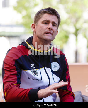 Valencia, Spain. 4th April, 2018. German team captain Michael Kohlmann (l) speaks to the press before the Davis Cup Quarterfinal match between Spain and Germany at the Plaza de Torros. Credit: Frank Molter/Alamy Live News Stock Photo