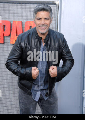 LOS ANGELES, CA - APRIL 04: Actor Esai Morales attends the premiere of Warner Bros. Pictures' 'Rampage' at Microsoft Theater on April 4, 2018 in Los Angeles, California. Photo by Barry King/Alamy Live News Stock Photo