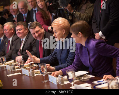 Washington, USA. 03rd Apr, 2018. Dalia Grybauskaite, President of Lithuania (2nd R) participates in a meeting with Kersti Kaljulaid (R), President of Estonia and President Raimonds Vejonis of Latvia at The White House in Washington, DC, April 3, 2018. - NO WIRE SERVICE - Credit: Chris Kleponis/Consolidated/dpa/Alamy Live News Stock Photo