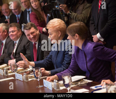 Washington, USA. 03rd Apr, 2018. Dalia Grybauskaite, President of Lithuania (2nd R) participates in a meeting with Kersti Kaljulaid (R), President of Estonia and President Raimonds Vejonis of Latvia at The White House in Washington, DC, April 3, 2018. - NO WIRE SERVICE - Credit: Chris Kleponis/Consolidated/dpa/Alamy Live News Stock Photo