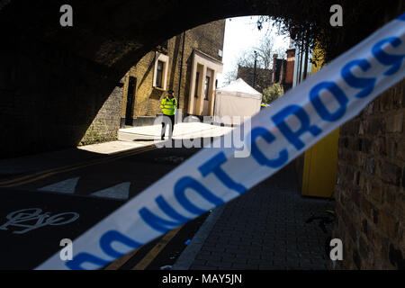 London UK 5th April 2018 Police at the scene where  Israel Ogunsolaaged 20, collapsed after being fatally stabbed last night near Link Street, Hackney. Credit: Thabo Jaiyesimi/Alamy Live News Stock Photo