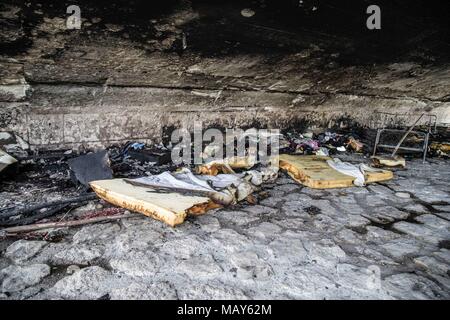 January 19, 2018 - A homeless camp under the ReichenbachbrÃƒÂ¼cke (Reichenbach Bridge) in Munich was the target of a suspected arson attack. The photos display the aftermath and the blackening of the surfaces of the bridge, as well as intense heat melting mattresses down to their springs. Damage to the bridge is estimated at 25,000 Euros. Four men, ages 24-53 were living there and unharmed. The suspects may have been two men who were standing near the fire and throwing objects into it. Credit: Sachelle Babbar/ZUMA Wire/Alamy Live News Stock Photo