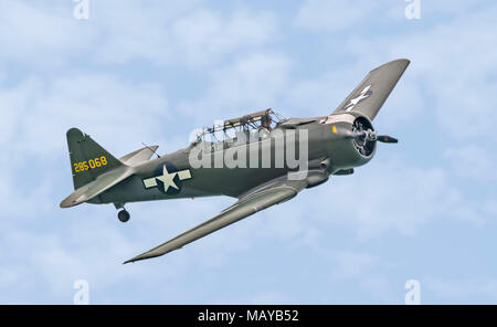 North American T-6 Texan vintage single propeller aircraft (registration  285068) flying in a single plane display in England, UK. Stock Photo