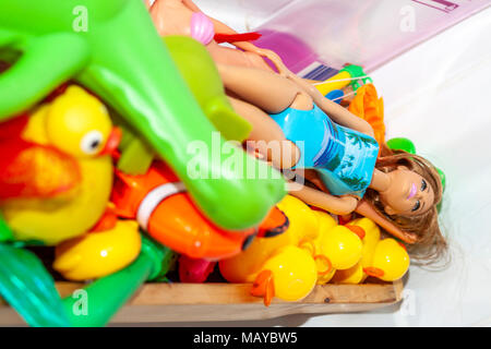 Variety of rubber bath ducks and toys in the bathroom Stock Photo