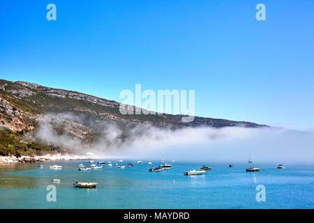 Foggy landscape in Porting da Arrabida, Portugal Stock Photo