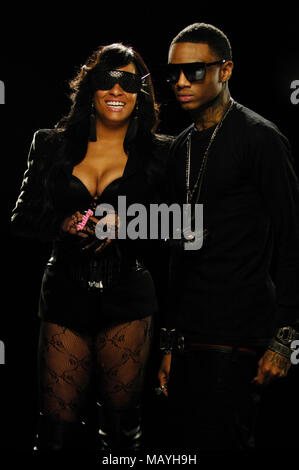 Rappers Hazel-E and Deandre Way aka Soulja Boy on set for Soulja Boy Tell 'Em 'All Black Everything' music video on February 11, 2010 in Los Angeles, California. Stock Photo