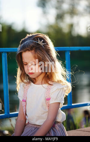 cute little crying girl with tiara Stock Photo