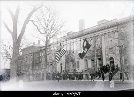 Antique c1920 photograph, crowds at University Hall at Harvard Yard on the campus of Harvard University in Cambridge, Massachusetts. Stock Photo
