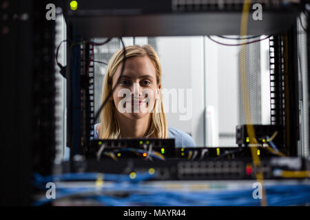 IT expert checking supercomputer server Stock Photo