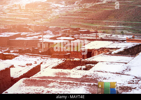 Snow covered Rooftop of the Village, Atlas Mountain, Morocco At Sunrise Stock Photo