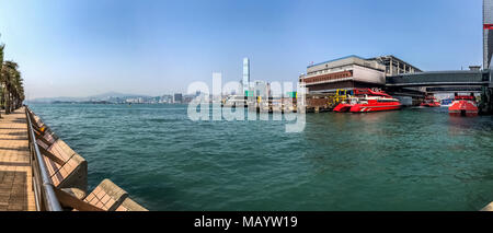 Central, Hong Kong  - March 23, 2018 : Hong Kong - Macau Ferry Terminal at Victoria Habour. It is a ferry terminal and heliport which provides ferry a Stock Photo