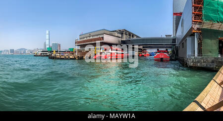 Central, Hong Kong  - March 23, 2018 : Hong Kong - Macau Ferry Terminal at Victoria Habour. It is a ferry terminal and heliport which provides ferry a Stock Photo