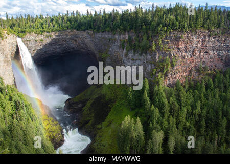 Rainbow shining at Helmcken Falls in Wells Gray Provincial Park near Clearwater, British Columbia, Canada Helmcken Falls is a 141 m waterfall on the M Stock Photo