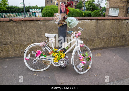White ghost bicycle roadside memorial at the spot where a cyclist was killed in a traffic accident, Haringey, London, UK Stock Photo