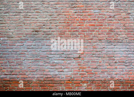 Old brick wall background or backdrop with copy space. Stone wall texture. Stock Photo