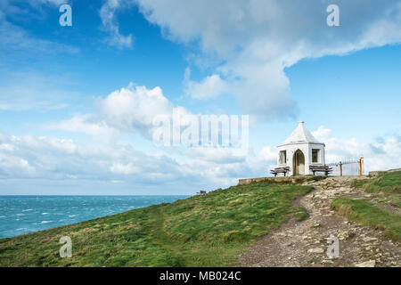 A small white building shelter on the top of Towan Head in Newquay in Cornwall. Stock Photo