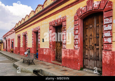 San Cristobal de las Casas, Mexico - March 26, 2015: Colorful buildings in  Calle Real de Guadalupe, San Cristobal de las Casas, Chiapas Stock Photo