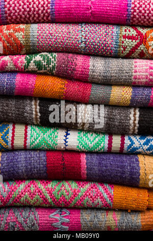 Colorful traditional peruvian fabrics on the market in Cusco, Peru Stock Photo