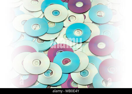 Random colorful DVD and CD disks create data concept background with gradation Stock Photo