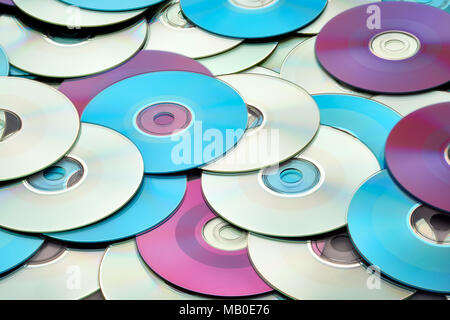Random abstract DVD and CD disks create data concept background Stock Photo